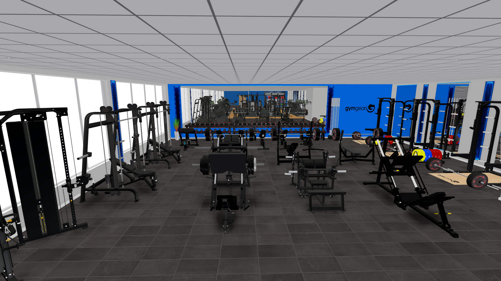 Digitally generated image to show the proposed layout of some of the refurbished gym at Heywood Sports Village. The gym is equipped with multiple strength-training machines arranged in rows, including squat racks, cable machines, and leg press stations. Free weights and barbells are visible on the right side, with colorful weight plates stacked nearby. Large mirrors line the back wall, reflecting the equipment, and the far wall displays a bright blue wall colour.