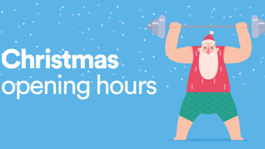 Illustration of a festive character dressed as Santa lifting a barbell against a blue background with falling snow. Text on the left reads ‘Christmas opening hours’ in bold white letters.