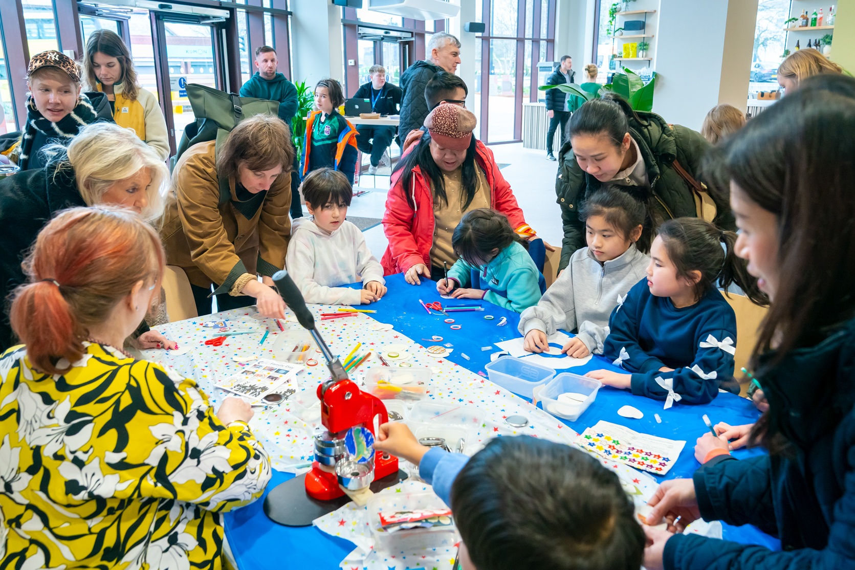 draft alt text for this image. activity at the community fun day for Heywood Civic reopening